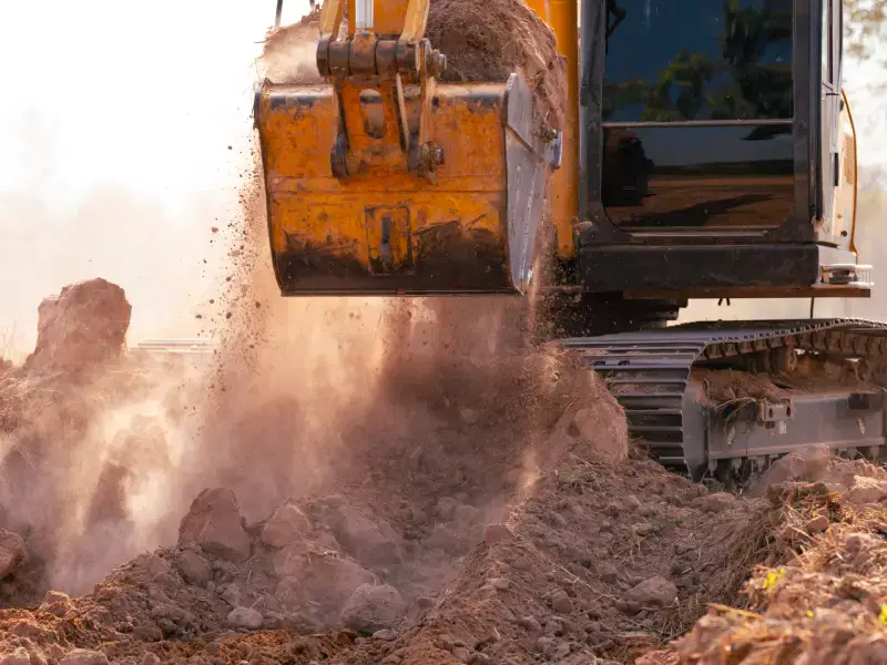 Freedom Land Management excavation bucket digging rocky soil nashville tn freedom land management